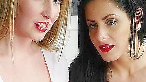 Two girls get it on the couch